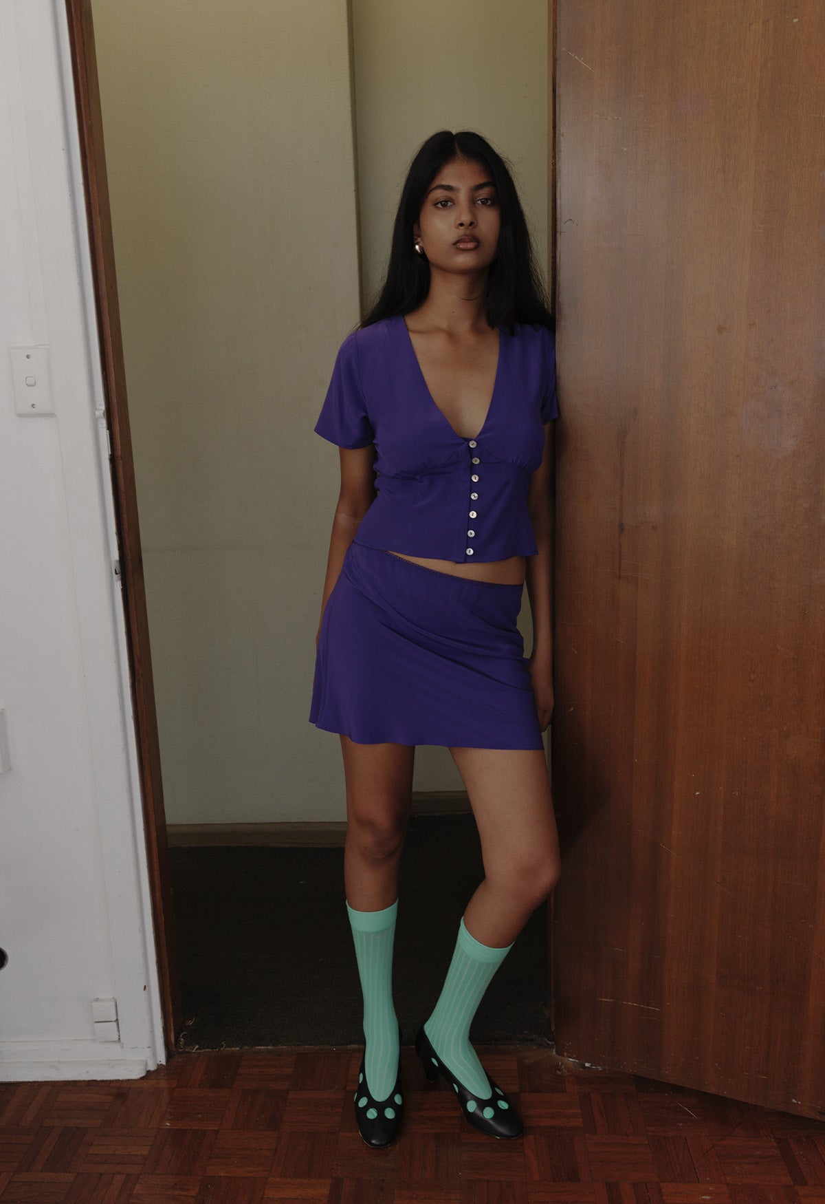 Chanelle is wearing a size 8