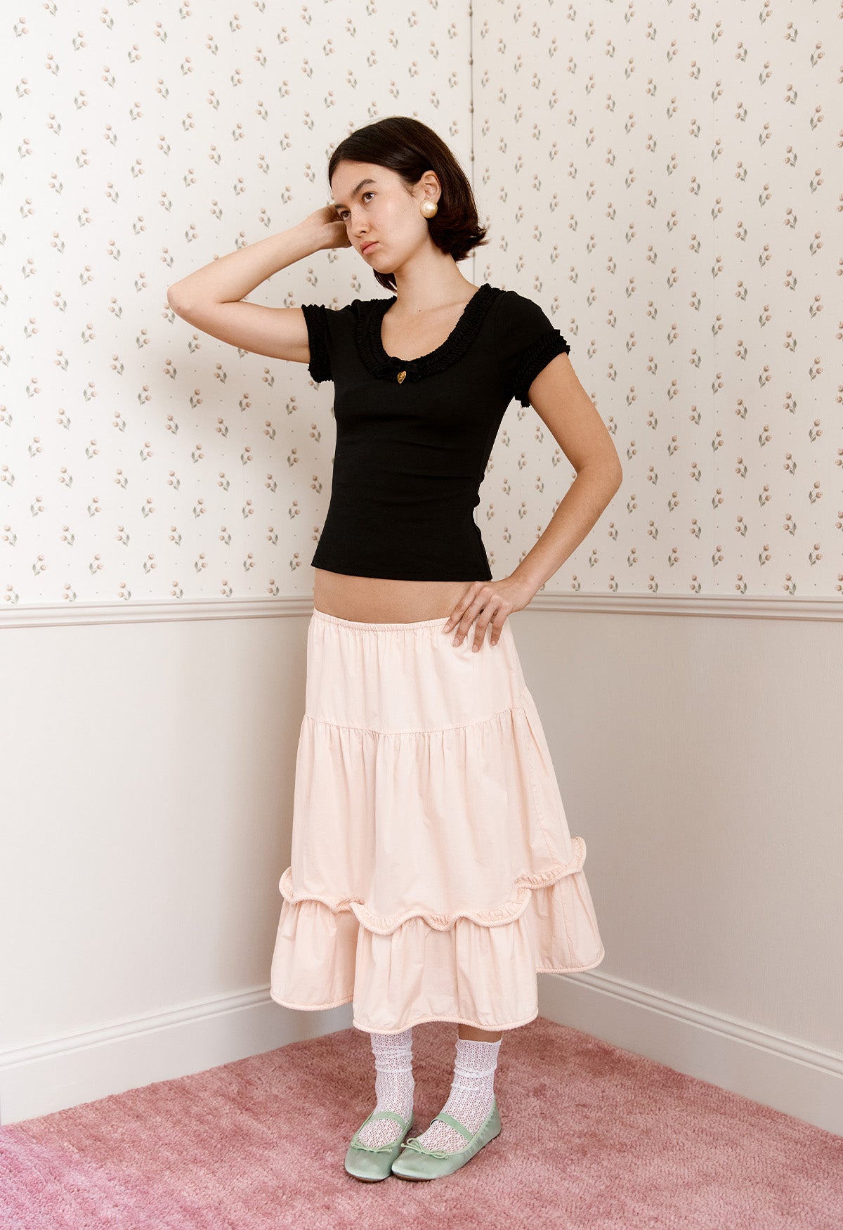 Eugenia is wearing a size 8