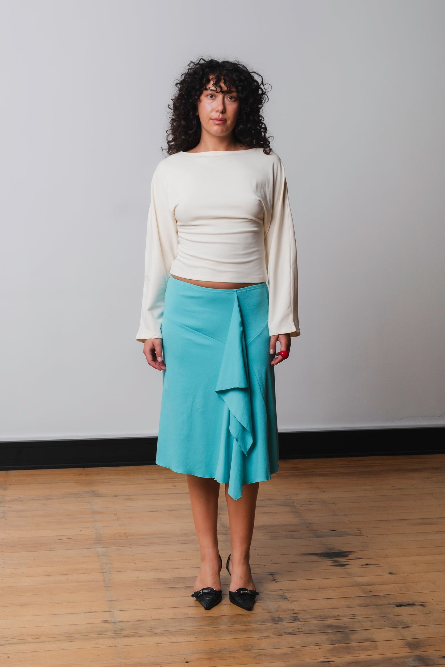 Angelica is wearing a size 12