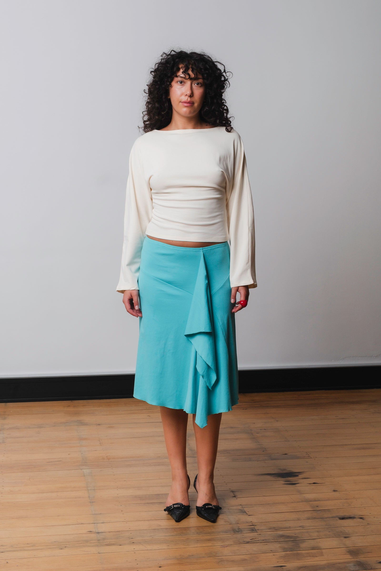 Angelica is wearing a size 12