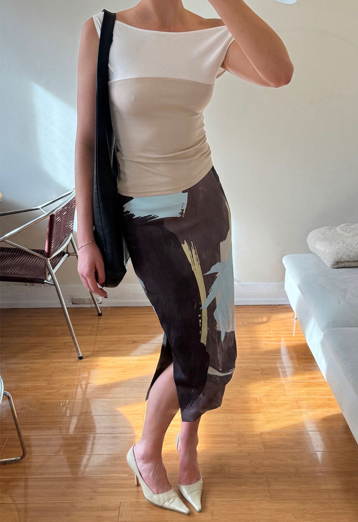 Adelaide is wearing a size 8