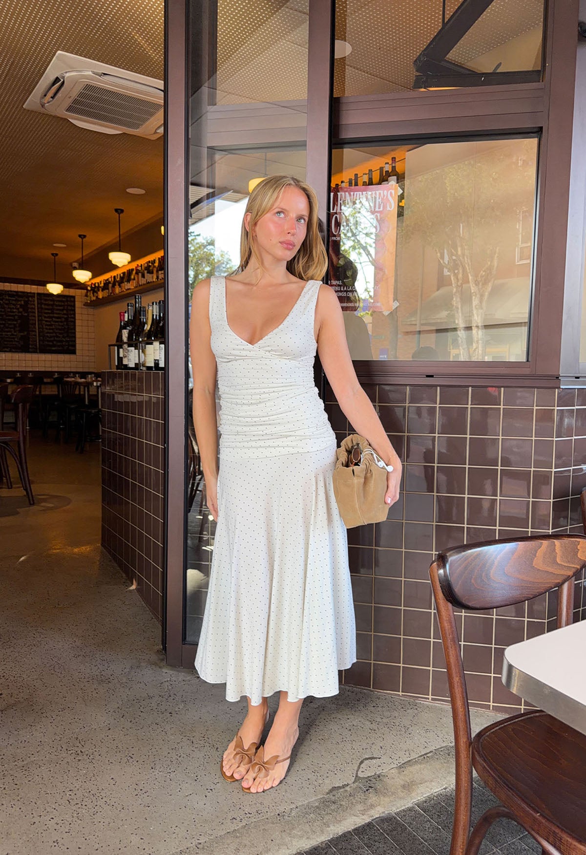 Hannah is wearing a size 8